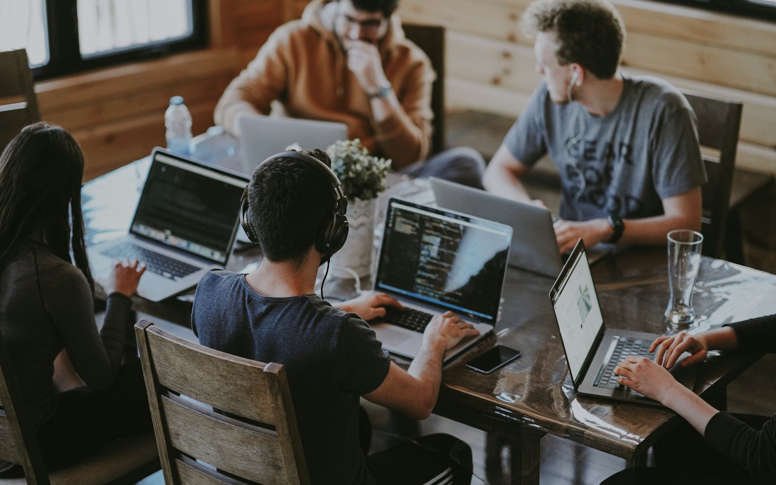 Engineers working together around a table